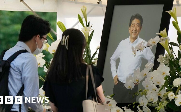  Shinzo Abe: ‘It’s just so sad’ – Mourners attend a vigil for Japan’s ex-leader