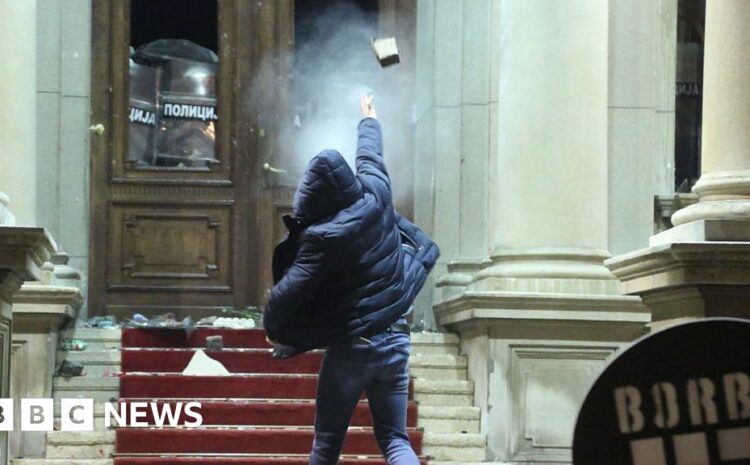  Serbia protests: Demonstrators throw rocks at Belgrade City Hall